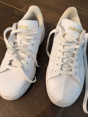 Adidas White Sneakers with Gold Logo